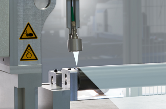 interferometer sensor head mounted above plastic film for thickness measurement